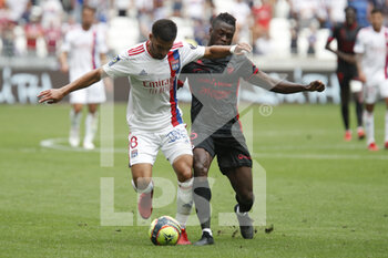 2021-08-22 - Houssem AOUAR of Lyon and Arial MENDY of Clermont during the French championship Ligue 1 football match between Olympique Lyonnais and Clermont Foot 63 on August 22, 2021 at Groupama stadium in Decines-Charpieu near Lyon, France - Photo Romain Biard / Isports / DPPI - OLYMPIQUE LYONNAIS VS CLERMONT FOOT 63 - FRENCH LIGUE 1 - SOCCER