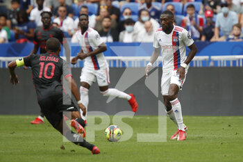 2021-08-22 - Karl TOKO EKAMBI of Lyon during the French championship Ligue 1 football match between Olympique Lyonnais and Clermont Foot 63 on August 22, 2021 at Groupama stadium in Decines-Charpieu near Lyon, France - Photo Romain Biard / Isports / DPPI - OLYMPIQUE LYONNAIS VS CLERMONT FOOT 63 - FRENCH LIGUE 1 - SOCCER