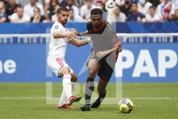 2021-08-22 - Cedric HOUNTONDJI of Clermont and Houssem AOUAR of Lyon during the French championship Ligue 1 football match between Olympique Lyonnais and Clermont Foot 63 on August 22, 2021 at Groupama stadium in Decines-Charpieu near Lyon, France - Photo Romain Biard / Isports / DPPI - OLYMPIQUE LYONNAIS VS CLERMONT FOOT 63 - FRENCH LIGUE 1 - SOCCER
