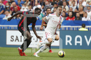2021-08-22 - Damien DA SILVA of Lyon and Mohamed BAYO of Clermont during the French championship Ligue 1 football match between Olympique Lyonnais and Clermont Foot 63 on August 22, 2021 at Groupama stadium in Decines-Charpieu near Lyon, France - Photo Romain Biard / Isports / DPPI - OLYMPIQUE LYONNAIS VS CLERMONT FOOT 63 - FRENCH LIGUE 1 - SOCCER