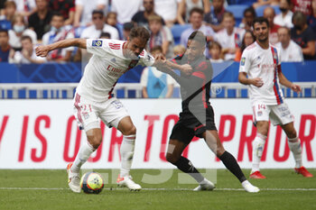 2021-08-22 - Damien DA SILVA of Lyon and Jim ALLEVINAH of Clermont during the French championship Ligue 1 football match between Olympique Lyonnais and Clermont Foot 63 on August 22, 2021 at Groupama stadium in Decines-Charpieu near Lyon, France - Photo Romain Biard / Isports / DPPI - OLYMPIQUE LYONNAIS VS CLERMONT FOOT 63 - FRENCH LIGUE 1 - SOCCER