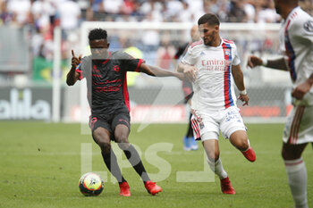 2021-08-22 - Salis ABDUL SAMED of Clermont and Houssem AOUAR of Lyon during the French championship Ligue 1 football match between Olympique Lyonnais and Clermont Foot 63 on August 22, 2021 at Groupama stadium in Decines-Charpieu near Lyon, France - Photo Romain Biard / Isports / DPPI - OLYMPIQUE LYONNAIS VS CLERMONT FOOT 63 - FRENCH LIGUE 1 - SOCCER
