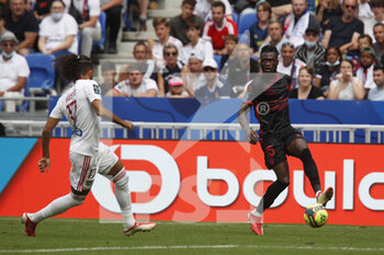 2021-08-22 - Arial MENDY of Clermont and Malo GUSTO of Lyon during the French championship Ligue 1 football match between Olympique Lyonnais and Clermont Foot 63 on August 22, 2021 at Groupama stadium in Decines-Charpieu near Lyon, France - Photo Romain Biard / Isports / DPPI - OLYMPIQUE LYONNAIS VS CLERMONT FOOT 63 - FRENCH LIGUE 1 - SOCCER