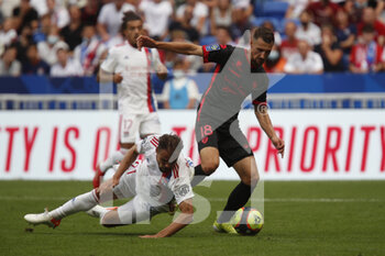 2021-08-22 - Elbasan RASHANI of Clermont and Damien DA SILVA of Lyon during the French championship Ligue 1 football match between Olympique Lyonnais and Clermont Foot 63 on August 22, 2021 at Groupama stadium in Decines-Charpieu near Lyon, France - Photo Romain Biard / Isports / DPPI - OLYMPIQUE LYONNAIS VS CLERMONT FOOT 63 - FRENCH LIGUE 1 - SOCCER