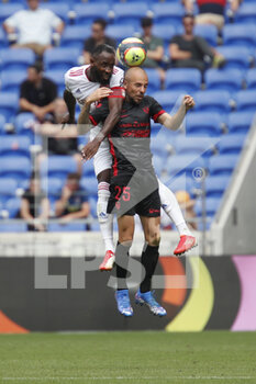 2021-08-22 - Johan GASTIEN of Clermont and Moussa DEMBELE of Lyon during the French championship Ligue 1 football match between Olympique Lyonnais and Clermont Foot 63 on August 22, 2021 at Groupama stadium in Decines-Charpieu near Lyon, France - Photo Romain Biard / Isports / DPPI - OLYMPIQUE LYONNAIS VS CLERMONT FOOT 63 - FRENCH LIGUE 1 - SOCCER
