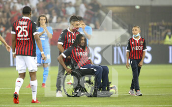 2021-08-22 - Tribute to Kevin Anin, former player of Nice paralyzed after a car accident before the French championship Ligue 1 football match between OGC Nice (OGCN) and Olympique de Marseille (OM) on August 22, 2021 at Allianz Riviera stadium in Nice, France - Photo Jean Catuffe / DPPI - OGC NICE (OGCN) VS OLYMPIQUE DE MARSEILLE (OM) - FRENCH LIGUE 1 - SOCCER