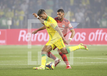 2021-08-27 - Ludovic Blas of Nantes, Houssem Aouar of Lyon during the French championship Ligue 1 football match between FC Nantes and Olympique Lyonnais (OL) on August 27, 2021 at Stade de La Beaujoire - Louis Fonteneau in Nantes, France - Photo Jean Catuffe / DPPI - FC NANTES VS OLYMPIQUE LYONNAIS - FRENCH LIGUE 1 - SOCCER