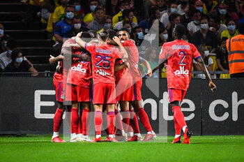 2021-08-27 - Moussa DEMBELE of Lyon celebrate his goal with teammates during the French championship Ligue 1 football match between FC Nantes and Olympique Lyonnais on August 27, 2021 at La Beaujoire - Louis Fonteneau stadium in Nantes, France - Photo Matthieu Mirville / DPPI - FC NANTES VS OLYMPIQUE LYONNAIS - FRENCH LIGUE 1 - SOCCER