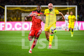 2021-08-27 - Moussa DEMBELE of Lyon and Nicolas PALLOIS of Nantes during the French championship Ligue 1 football match between FC Nantes and Olympique Lyonnais on August 27, 2021 at La Beaujoire - Louis Fonteneau stadium in Nantes, France - Photo Matthieu Mirville / DPPI - FC NANTES VS OLYMPIQUE LYONNAIS - FRENCH LIGUE 1 - SOCCER