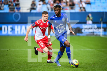 2021-08-29 - Caio HENRIQUE of Monaco and Rominigue KOUAME of ESTAC Troyes during the French championship Ligue 1 football match between ESTAC Troyes and AS Monaco on August 29, 2021 at Stade de L'Aube in Troyes, France - Photo Matthieu Mirville / DPPI - ESTAC TROYES VS AS MONACO - FRENCH LIGUE 1 - SOCCER