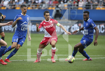 2021-08-29 - Wissam Ben Yedder of Monaco between Jimmy Giraudon and Yoann Salmier of Troyes during the French championship Ligue 1 football match between ESTAC Troyes and AS Monaco (ASM) on August 29, 2021 at Stade de L'Aube in Troyes, France - Photo Jean Catuffe / DPPI - ESTAC TROYES VS AS MONACO - FRENCH LIGUE 1 - SOCCER