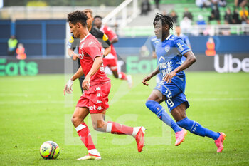 2021-08-29 - Sofiane DIOP of Monaco and Issa KABORE of Troyes during the French championship Ligue 1 football match between ESTAC Troyes and AS Monaco on August 29, 2021 at Stade de L'Aube in Troyes, France - Photo Matthieu Mirville / DPPI - ESTAC TROYES VS AS MONACO - FRENCH LIGUE 1 - SOCCER