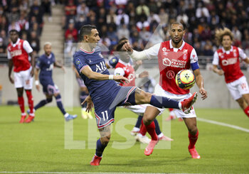 2021-08-29 - Angel Di Maria of PSG, Yunis Abdelhamid of Reims during the French championship Ligue 1 football match between Stade de Reims and Paris Saint-Germain on August 29, 2021 at Auguste Delaune stadium in Reims, France - Photo Jean Catuffe / DPPI - STADE DE REIMS VS PARIS SAINT-GERMAIN - FRENCH LIGUE 1 - SOCCER