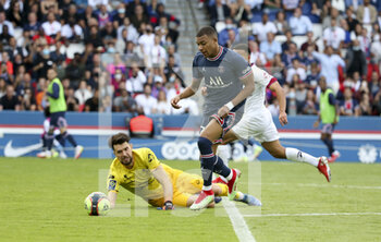 2021-09-11 - Kylian Mbappe of PSG avoids goalkeeper of Clermont Arthur Desmas to score his goal during the French championship Ligue 1 football match between Paris Saint-Germain and Clermont Foot 63 on September 11, 2021 at Parc des Princes stadium in Paris, France - PARIS SAINT-GERMAIN VS CLERMONT FOOT 63 - FRENCH LIGUE 1 - SOCCER