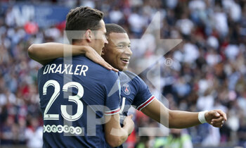 2021-09-11 - Kylian Mbappe of PSG celebrates his goal with Julian Draxler of PSG during the French championship Ligue 1 football match between Paris Saint-Germain (PSG) and Clermont Foot 63 on September 11, 2021 at Parc des Princes stadium in Paris, France - PARIS SAINT-GERMAIN VS CLERMONT FOOT 63 - FRENCH LIGUE 1 - SOCCER