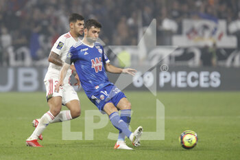 2021-09-12 - Sanjin PRCIC of Strasbourg and Bruno GUIMARAES of Lyon during the French championship Ligue 1 football match between Olympique lyonnais and Racing Club de Strasbourg Alsace on September 12, 2021 at Groupama Stadium in Décines-Charpieu, near Lyon, France - OLYMPIQUE LYONNAIS VS RACING CLUB DE STRASBOURG ALSACE - FRENCH LIGUE 1 - SOCCER