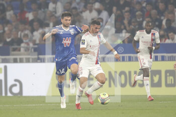 2021-09-12 - Houssem AOUAR of Lyon and Sanjin PRCIC of Strasbourg during the French championship Ligue 1 football match between Olympique lyonnais and Racing Club de Strasbourg Alsace on September 12, 2021 at Groupama Stadium in Décines-Charpieu, near Lyon, France - OLYMPIQUE LYONNAIS VS RACING CLUB DE STRASBOURG ALSACE - FRENCH LIGUE 1 - SOCCER