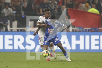 2021-09-12 - Jean Ricner BELLEGARDE of Strasbourg and Thiago MENDES of Lyon during the French championship Ligue 1 football match between Olympique lyonnais and Racing Club de Strasbourg Alsace on September 12, 2021 at Groupama Stadium in Décines-Charpieu, near Lyon, France - OLYMPIQUE LYONNAIS VS RACING CLUB DE STRASBOURG ALSACE - FRENCH LIGUE 1 - SOCCER