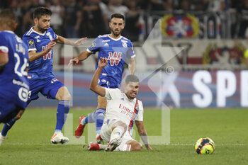 2021-09-12 - Bruno GUIMARAES of Lyon and Sanjin PRCIC of Strasbourg during the French championship Ligue 1 football match between Olympique lyonnais and Racing Club de Strasbourg Alsace on September 12, 2021 at Groupama Stadium in Décines-Charpieu, near Lyon, France - OLYMPIQUE LYONNAIS VS RACING CLUB DE STRASBOURG ALSACE - FRENCH LIGUE 1 - SOCCER