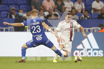 2021-09-12 - Xherdan SHAQIRI of Lyon and Maxime LE MARCHAND of Strasbourg during the French championship Ligue 1 football match between Olympique lyonnais and Racing Club de Strasbourg Alsace on September 12, 2021 at Groupama Stadium in Décines-Charpieu, near Lyon, France - OLYMPIQUE LYONNAIS VS RACING CLUB DE STRASBOURG ALSACE - FRENCH LIGUE 1 - SOCCER