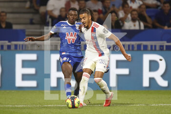 2021-09-12 - Malo GUSTO of Lyon and Jean Ricner BELLEGARDE of Strasbourg during the French championship Ligue 1 football match between Olympique lyonnais and Racing Club de Strasbourg Alsace on September 12, 2021 at Groupama Stadium in Décines-Charpieu, near Lyon, France - OLYMPIQUE LYONNAIS VS RACING CLUB DE STRASBOURG ALSACE - FRENCH LIGUE 1 - SOCCER