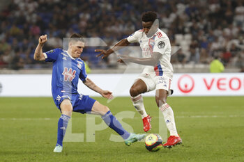 2021-09-12 - Thiago MENDES of Lyon and Kevin GAMEIRO of Strasbourg during the French championship Ligue 1 football match between Olympique lyonnais and Racing Club de Strasbourg Alsace on September 12, 2021 at Groupama Stadium in Décines-Charpieu, near Lyon, France - OLYMPIQUE LYONNAIS VS RACING CLUB DE STRASBOURG ALSACE - FRENCH LIGUE 1 - SOCCER