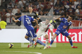 2021-09-12 - Houssem AOUAR of Lyon and Adrien THOMASSON of Strasbourg and Sanjin PRCIC of Strasbourg during the French championship Ligue 1 football match between Olympique lyonnais and Racing Club de Strasbourg Alsace on September 12, 2021 at Groupama Stadium in Décines-Charpieu, near Lyon, France - OLYMPIQUE LYONNAIS VS RACING CLUB DE STRASBOURG ALSACE - FRENCH LIGUE 1 - SOCCER