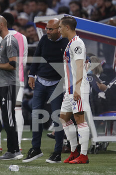 2021-09-12 - Peter BOSZ coach of Lyon and Maxence CAQUERET of Lyon during the French championship Ligue 1 football match between Olympique lyonnais and Racing Club de Strasbourg Alsace on September 12, 2021 at Groupama Stadium in Décines-Charpieu, near Lyon, France - OLYMPIQUE LYONNAIS VS RACING CLUB DE STRASBOURG ALSACE - FRENCH LIGUE 1 - SOCCER