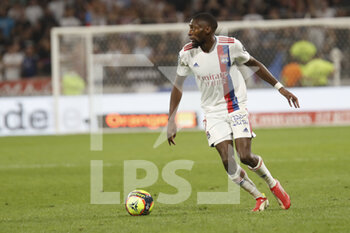 2021-09-12 - Karl TOKO EKAMBI of Lyon during the French championship Ligue 1 football match between Olympique lyonnais and Racing Club de Strasbourg Alsace on September 12, 2021 at Groupama Stadium in Décines-Charpieu, near Lyon, France - OLYMPIQUE LYONNAIS VS RACING CLUB DE STRASBOURG ALSACE - FRENCH LIGUE 1 - SOCCER