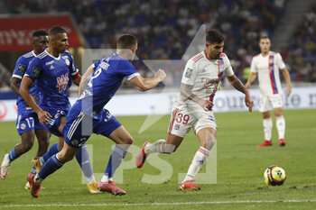 2021-09-12 - Bruno GUIMARAES of Lyon and Frederic GUILBERT of Strasbourg during the French championship Ligue 1 football match between Olympique lyonnais and Racing Club de Strasbourg Alsace on September 12, 2021 at Groupama Stadium in Décines-Charpieu, near Lyon, France - OLYMPIQUE LYONNAIS VS RACING CLUB DE STRASBOURG ALSACE - FRENCH LIGUE 1 - SOCCER