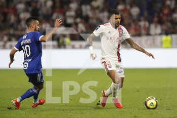 2021-09-12 - Emerson PALMIERI of Lyon and Adrien THOMASSON of Strasbourg during the French championship Ligue 1 football match between Olympique lyonnais and Racing Club de Strasbourg Alsace on September 12, 2021 at Groupama Stadium in Décines-Charpieu, near Lyon, France - OLYMPIQUE LYONNAIS VS RACING CLUB DE STRASBOURG ALSACE - FRENCH LIGUE 1 - SOCCER