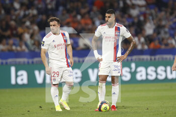 2021-09-12 - Xherdan SHAQIRI of Lyon and Emerson PALMIERI of Lyon during the French championship Ligue 1 football match between Olympique lyonnais and Racing Club de Strasbourg Alsace on September 12, 2021 at Groupama Stadium in Décines-Charpieu, near Lyon, France - OLYMPIQUE LYONNAIS VS RACING CLUB DE STRASBOURG ALSACE - FRENCH LIGUE 1 - SOCCER