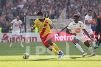 2021-09-18 - Kevin DANSO 4 Lens and Jonathan DAVID 9 LOSC during the French championship Ligue 1 football match between RC Lens and Lille OSC, LOSC, on September 18, 2021 at Bollaert-Delelis stadium in Lens, France - RC LENS VS LILLE OSC - FRENCH LIGUE 1 - SOCCER