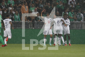 2021-09-18 - Ui Jo HWANG of Bordeaux and Yacine ADLI of Bordeaux during the French championship Ligue 1 football match between AS Saint-Etienne and FC Girondins de Bordeaux on September 18, 2021 at Geoffroy-Guichard stadium in Saint-Etienne, France - AS SAINT-ETIENNE VS FC GIRONDINS DE BORDEAUX - FRENCH LIGUE 1 - SOCCER