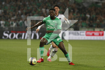 2021-09-18 - Saidou SOW of Saint Etienne and Ui Jo HWANG of Bordeaux during the French championship Ligue 1 football match between AS Saint-Etienne and FC Girondins de Bordeaux on September 18, 2021 at Geoffroy-Guichard stadium in Saint-Etienne, France - AS SAINT-ETIENNE VS FC GIRONDINS DE BORDEAUX - FRENCH LIGUE 1 - SOCCER