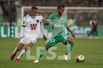 2021-09-18 - Miguel TRAUCO of Saint Etienne and Mehdi ZERKANE of Bordeaux during the French championship Ligue 1 football match between AS Saint-Etienne and FC Girondins de Bordeaux on September 18, 2021 at Geoffroy-Guichard stadium in Saint-Etienne, France - AS SAINT-ETIENNE VS FC GIRONDINS DE BORDEAUX - FRENCH LIGUE 1 - SOCCER