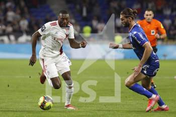 2021-09-25 - Karl TOKO EKAMBI of Lyon and Leo PETROT of Lorient during the French championship Ligue 1 football match between Olympique Lyonnais and FC Lorient on September 25, 2021 at Groupama stadium in Decines-Charpieu near Lyon, France - OLYMPIQUE LYONNAIS VS FC LORIENT - FRENCH LIGUE 1 - SOCCER