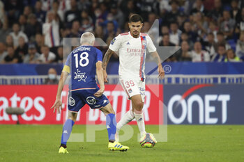 2021-09-25 - Bruno GUIMARAES of Lyon and Fabien LEMOINE of Lorient during the French championship Ligue 1 football match between Olympique Lyonnais and FC Lorient on September 25, 2021 at Groupama stadium in Decines-Charpieu near Lyon, France - OLYMPIQUE LYONNAIS VS FC LORIENT - FRENCH LIGUE 1 - SOCCER