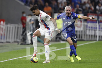 2021-09-25 - Lucas PAQUETA of Lyon and Fabien LEMOINE of Lorient during the French championship Ligue 1 football match between Olympique Lyonnais and FC Lorient on September 25, 2021 at Groupama stadium in Decines-Charpieu near Lyon, France - OLYMPIQUE LYONNAIS VS FC LORIENT - FRENCH LIGUE 1 - SOCCER