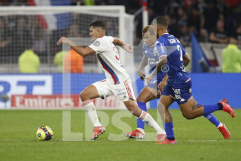 2021-09-25 - Bruno GUIMARAES of Lyon and Armand LORIENTE of Lorient and Igor SILVA DE ALMEIDA of Lorient during the French championship Ligue 1 football match between Olympique Lyonnais and FC Lorient on September 25, 2021 at Groupama stadium in Decines-Charpieu near Lyon, France - OLYMPIQUE LYONNAIS VS FC LORIENT - FRENCH LIGUE 1 - SOCCER