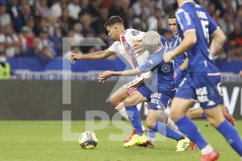 2021-09-25 - Bruno GUIMARAES of Lyon and Fabien LEMOINE of Lorient during the French championship Ligue 1 football match between Olympique Lyonnais and FC Lorient on September 25, 2021 at Groupama stadium in Decines-Charpieu near Lyon, France - OLYMPIQUE LYONNAIS VS FC LORIENT - FRENCH LIGUE 1 - SOCCER