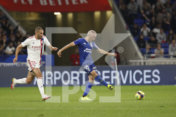 2021-09-25 - Fabien LEMOINE of Lorient and Islam SLIMANI of Lyon during the French championship Ligue 1 football match between Olympique Lyonnais and FC Lorient on September 25, 2021 at Groupama stadium in Decines-Charpieu near Lyon, France - OLYMPIQUE LYONNAIS VS FC LORIENT - FRENCH LIGUE 1 - SOCCER