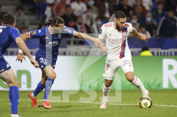 2021-09-25 - Rayan CHERKI of Lyon and Leo PETROT of Lorient during the French championship Ligue 1 football match between Olympique Lyonnais and FC Lorient on September 25, 2021 at Groupama stadium in Decines-Charpieu near Lyon, France - OLYMPIQUE LYONNAIS VS FC LORIENT - FRENCH LIGUE 1 - SOCCER