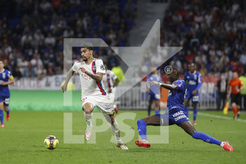 2021-09-25 - Lucas PAQUETA of Lyon and Houboulang MENDES of Lorient during the French championship Ligue 1 football match between Olympique Lyonnais and FC Lorient on September 25, 2021 at Groupama stadium in Decines-Charpieu near Lyon, France - OLYMPIQUE LYONNAIS VS FC LORIENT - FRENCH LIGUE 1 - SOCCER