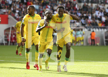 2021-09-26 - Moses Simon of Nantes celebrates his goal with Charles Traore during the French championship Ligue 1 football match between Stade de Reims and FC Nantes (FCN) on September 26, 2021 at Stade Auguste Delaune in Reims, France - STADE DE REIMS VS FC NANTES (FCN) - FRENCH LIGUE 1 - SOCCER