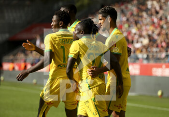 2021-09-26 - Moses Simon of Nantes celebrates his goal with Charles Traore, Ludovic Blas during the French championship Ligue 1 football match between Stade de Reims and FC Nantes (FCN) on September 26, 2021 at Stade Auguste Delaune in Reims, France - STADE DE REIMS VS FC NANTES (FCN) - FRENCH LIGUE 1 - SOCCER