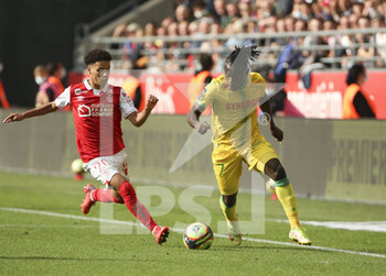 2021-09-26 - Moses Simon of Nantes, Ilan Kebbal of Reims (left) during the French championship Ligue 1 football match between Stade de Reims and FC Nantes (FCN) on September 26, 2021 at Stade Auguste Delaune in Reims, France - STADE DE REIMS VS FC NANTES (FCN) - FRENCH LIGUE 1 - SOCCER