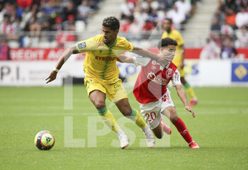 2021-09-26 - Ludovic Blas of Nantes, Ilan Kebbal of Reims during the French championship Ligue 1 football match between Stade de Reims and FC Nantes (FCN) on September 26, 2021 at Stade Auguste Delaune in Reims, France - STADE DE REIMS VS FC NANTES (FCN) - FRENCH LIGUE 1 - SOCCER