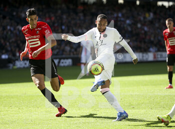 2021-10-03 - Neymar Jr of PSG, Nayef Aguerd of Rennes (left) during the French championship Ligue 1 football match between Stade Rennais and Paris Saint-Germain (PSG) on October 3, 2021 at Roazhon Park in Rennes, France - STADE RENNAIS VS PARIS SAINT-GERMAIN (PSG) - FRENCH LIGUE 1 - SOCCER