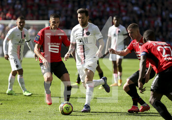 2021-10-03 - Lionel Messi of PSG, Jonas Martin of Rennes (left) during the French championship Ligue 1 football match between Stade Rennais and Paris Saint-Germain (PSG) on October 3, 2021 at Roazhon Park in Rennes, France - STADE RENNAIS VS PARIS SAINT-GERMAIN (PSG) - FRENCH LIGUE 1 - SOCCER